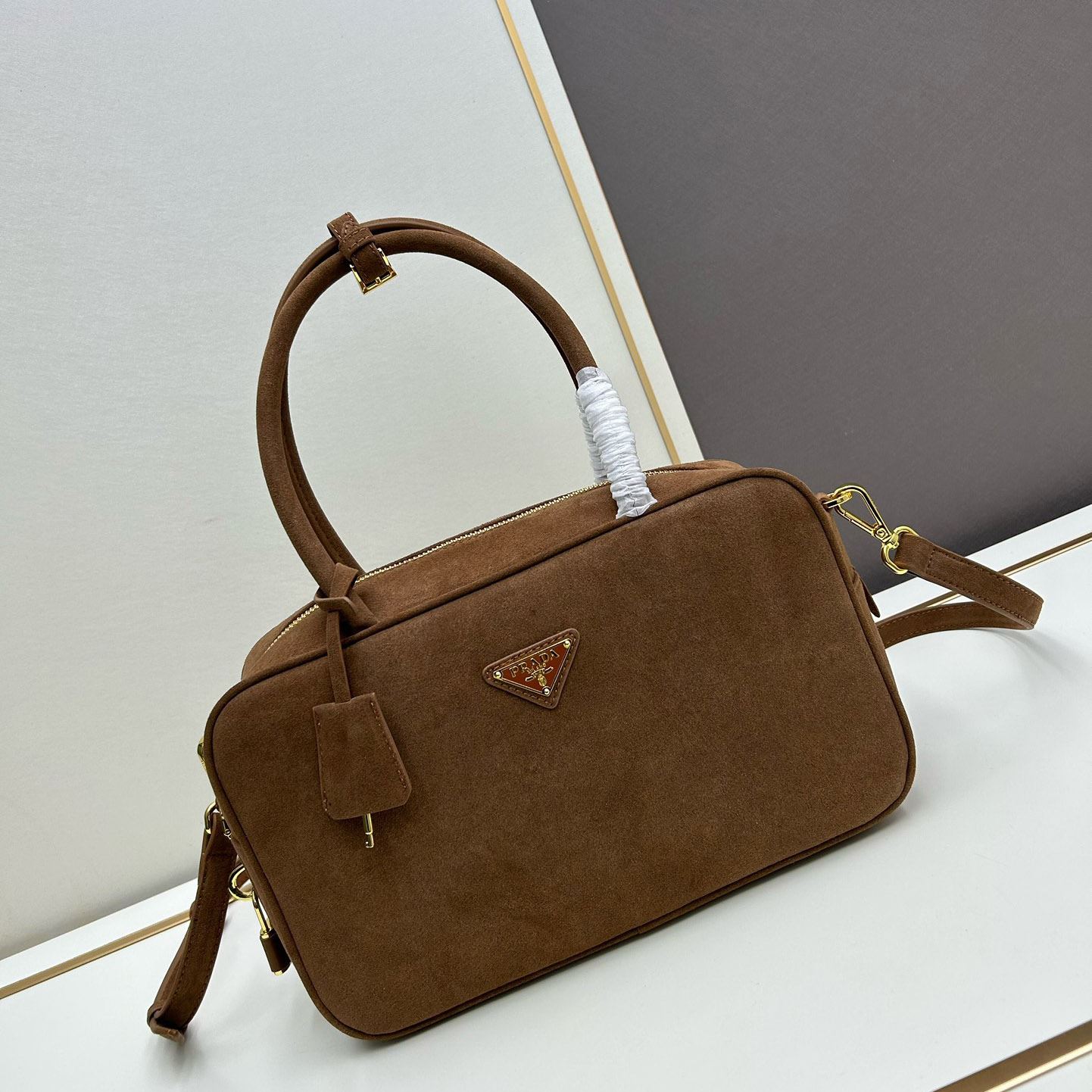 Pra*a top handle bags